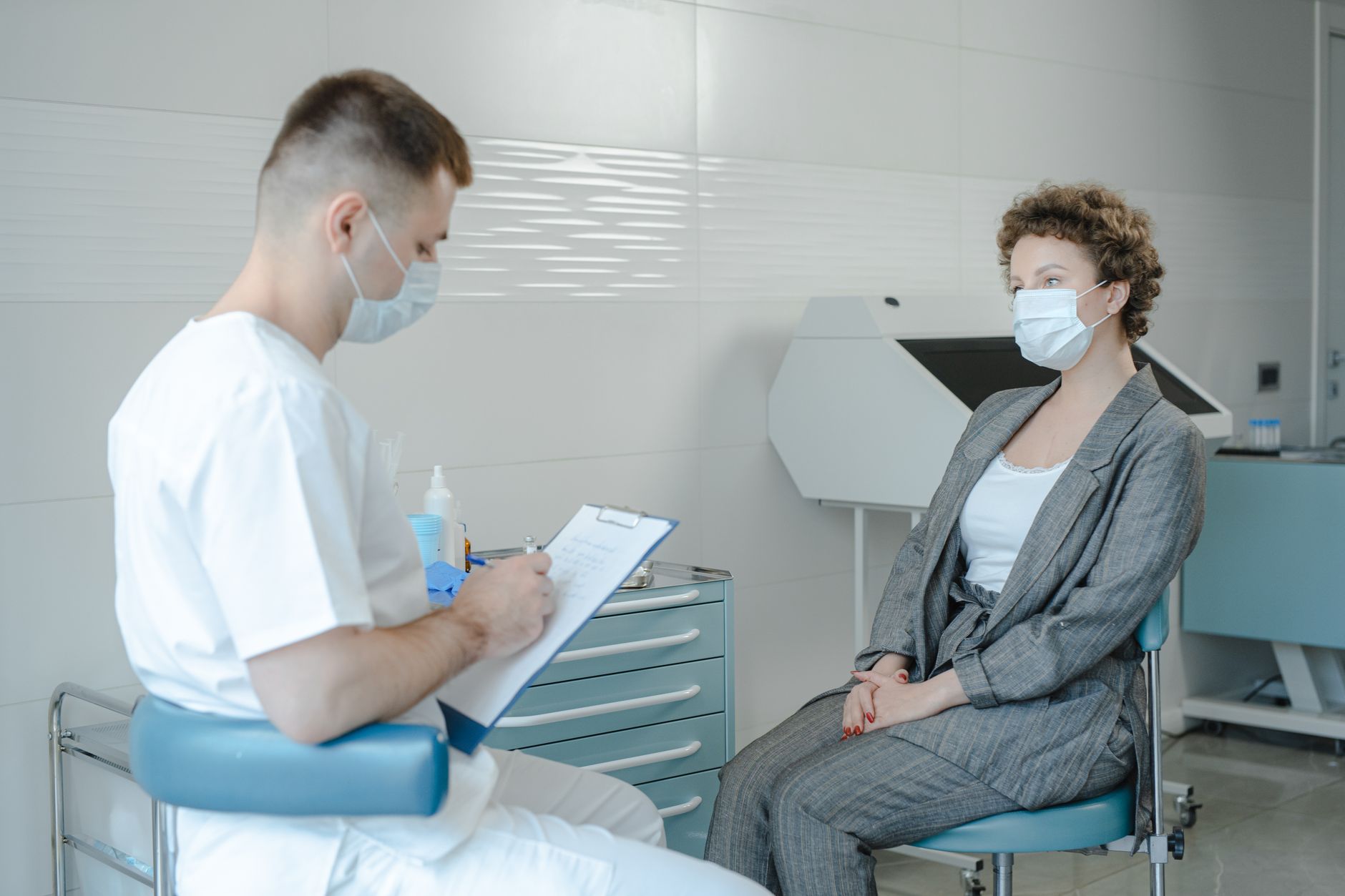 A doctor consulting warmly with a patient